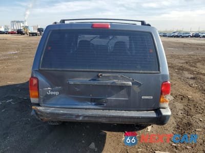 Zdjęcie 6 z 14 samochodu: 2001 JEEP CHEROKEE SPORT VIN:1J4FF48S21L546251 - miniatura