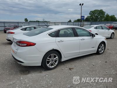 Trzecie zdjęcie samochodu z tyłu: 2018 FORD FUSION SE HYBRID VIN:3FA6P0LU5JR129914 - miniatura
