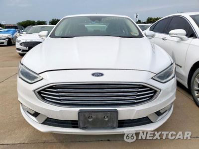 Piąte zdjęcie samochodu w środku: 2017 FORD FUSION SE HYBRID VIN:3FA6P0LU0HR409721 - miniatura