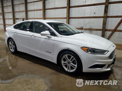 Czwarte zdjęcie samochodu z boku: 2018 FORD FUSION SE HYBRID VIN:3FA6P0LU6JR118842 - miniatura
