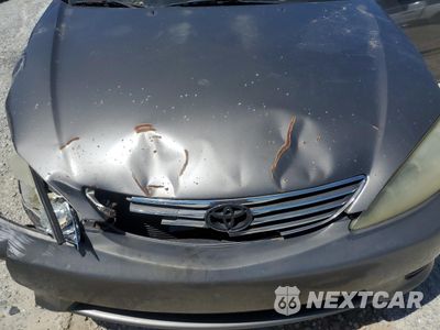 Zdjęcie 11 z 15 samochodu: 2005 TOYOTA CAMRY LE VIN:4T1BE30K55U947818 - miniatura