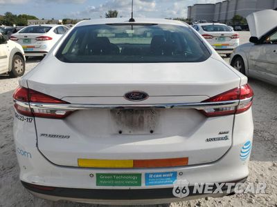 Zdjęcie 6 z 12 samochodu: 2017 FORD FUSION SE HYBRID VIN:3FA6P0LU5HR409472 - miniatura