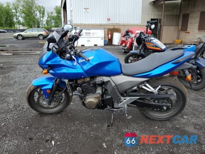 Trzecie zdjęcie samochodu z tyłu: 2005 KAWASAKI ZR750 K1 VIN:JKAZRDK155A001229 - miniatura