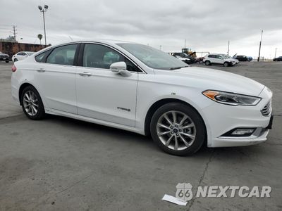 Czwarte zdjęcie samochodu z boku: 2017 FORD FUSION SE HYBRID VIN:3FA6P0LU5HR409746 - miniatura