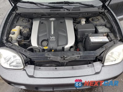 Zdjęcie 12 z 13 samochodu: 2004 HYUNDAI SANTA FE GLS VIN:KM8SC13E14U721273 - miniatura