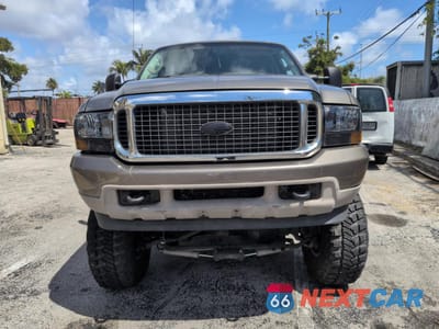 Zdjęcie 13 z 15 samochodu: 2004 FORD EXCURSION LIMITED VIN:1FMSU43P44EA56041 - miniatura
