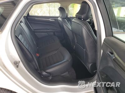 Zdjęcie 10 z 12 samochodu: 2017 FORD FUSION SE HYBRID VIN:3FA6P0LU0HR359578 - miniatura