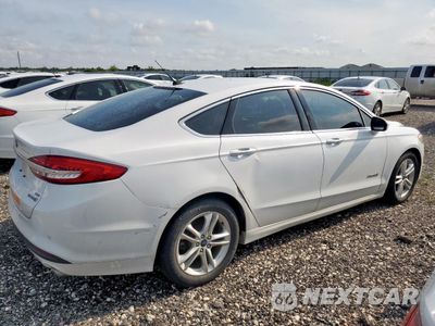 Trzecie zdjęcie samochodu z tyłu: 2018 FORD FUSION SE HYBRID VIN:3FA6P0LUXJR171687 - miniatura