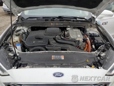 Zdjęcie 11 z 13 samochodu: 2018 FORD FUSION SE HYBRID VIN:3FA6P0LU5JR172102 - miniatura