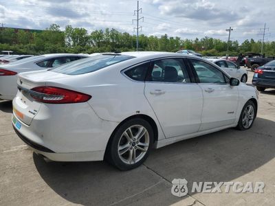 Trzecie zdjęcie samochodu z tyłu: 2018 FORD FUSION SE HYBRID VIN:3FA6P0LU3JR118829 - miniatura
