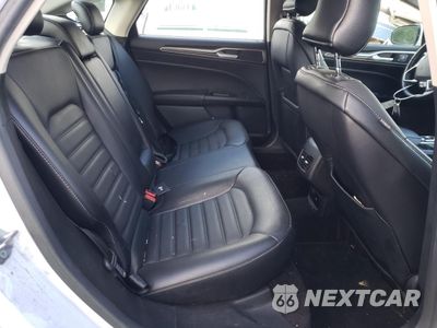 Zdjęcie 10 z 12 samochodu: 2017 FORD FUSION SE HYBRID VIN:3FA6P0LU2HR359596 - miniatura