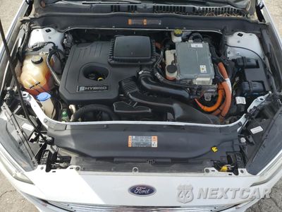 Zdjęcie 11 z 12 samochodu: 2018 FORD FUSION SE HYBRID VIN:3FA6P0LU0JR172119 - miniatura