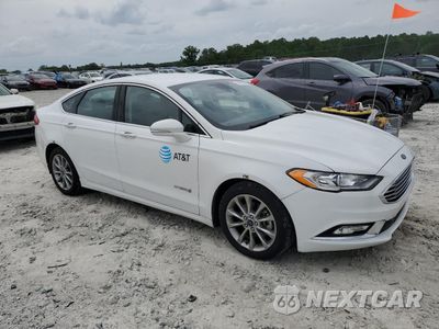 Czwarte zdjęcie samochodu z boku: 2017 FORD FUSION SE HYBRID VIN:3FA6P0LU9HR409412 - miniatura