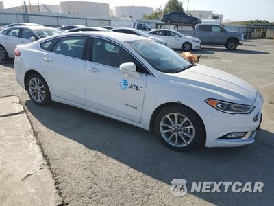 Czwarte zdjęcie samochodu z boku: 2017 FORD FUSION SE HYBRID VIN:3FA6P0LUXHR400752 - miniatura