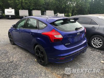 Trzecie zdjęcie samochodu z tyłu: 2013 FORD FOCUS ST VIN:1FADP3L97DL126987 - miniatura