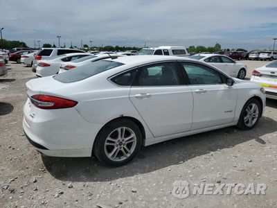 Trzecie zdjęcie samochodu z tyłu: 2018 FORD FUSION SE HYBRID VIN:3FA6P0LU1JR172033 - miniatura