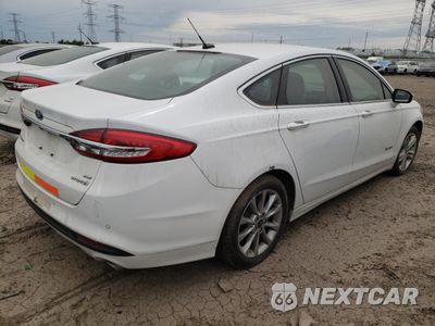 Trzecie zdjęcie samochodu z tyłu: 2017 FORD FUSION SE HYBRID VIN:3FA6P0LU1HR409078 - miniatura