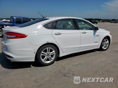 Trzecie zdjęcie samochodu z tyłu: 2018 FORD FUSION SE HYBRID VIN:3FA6P0LU6JR171654 - miniatura