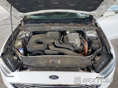 Zdjęcie 11 z 12 samochodu: 2017 FORD FUSION SE HYBRID VIN:3FA6P0LU0HR359578 - miniatura