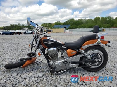 Trzecie zdjęcie samochodu z tyłu: 2011 SUZUKI LS650 VIN:JS1NP41A9B2100809 - miniatura