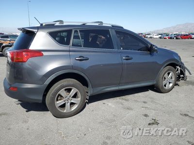 Trzecie zdjęcie samochodu z tyłu: 2015 TOYOTA RAV4 XLE VIN:JTMWFREV1FJ033206 - miniatura