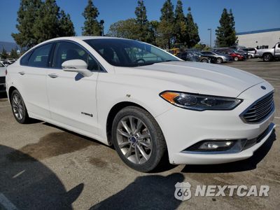Czwarte zdjęcie samochodu z boku: 2017 FORD FUSION SE HYBRID VIN:3FA6P0LU0HR409332 - miniatura