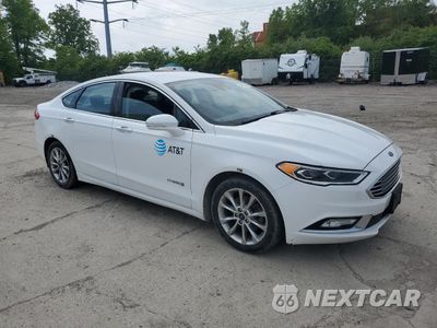Czwarte zdjęcie samochodu z boku: 2017 FORD FUSION SE HYBRID VIN:3FA6P0LU6HR410095 - miniatura