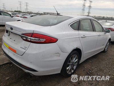 Trzecie zdjęcie samochodu z tyłu: 2017 FORD FUSION SE HYBRID VIN:3FA6P0LU2HR409106 - miniatura