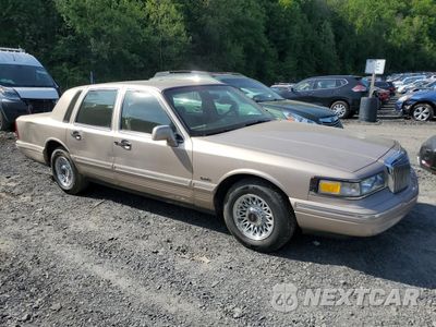 Czwarte zdjęcie samochodu z boku: 1997 LINCOLN TOWN CAR EXECUTIVE VIN:1LNLM81W7VY737737 - miniatura