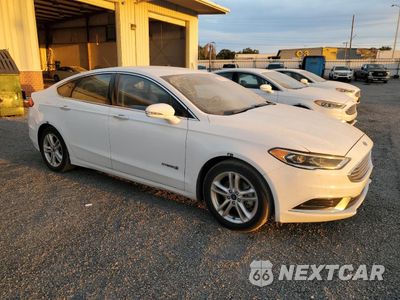 Czwarte zdjęcie samochodu z boku: 2018 FORD FUSION SE HYBRID VIN:3FA6P0LU5JR129878 - miniatura