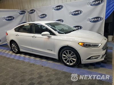 Czwarte zdjęcie samochodu z boku: 2017 FORD FUSION SE HYBRID VIN:3FA6P0LUXHR409497 - miniatura