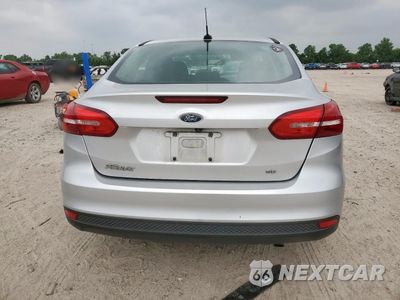 Zdjęcie 6 z 16 samochodu: 2018 FORD FOCUS SE VIN:1FADP3F20JL207047 - miniatura