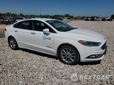 Czwarte zdjęcie samochodu z boku: 2017 FORD FUSION SE HYBRID VIN:3FA6P0LU0HR409069 - miniatura