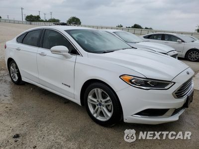 Czwarte zdjęcie samochodu z boku: 2018 FORD FUSION SE HYBRID VIN:3FA6P0LU9JR171888 - miniatura