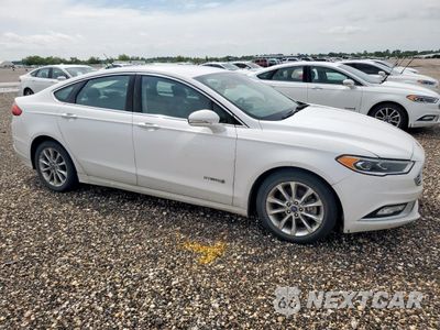 Czwarte zdjęcie samochodu z boku: 2017 FORD FUSION SE HYBRID VIN:3FA6P0LU6HR410145 - miniatura