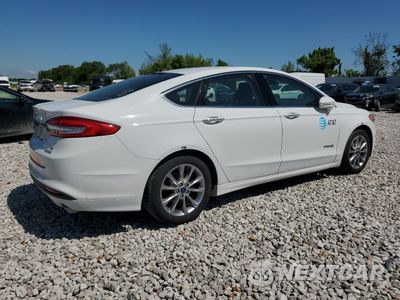 Trzecie zdjęcie samochodu z tyłu: 2017 FORD FUSION SE HYBRID VIN:3FA6P0LU6HR409075 - miniatura