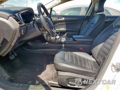 Zdjęcie 7 z 12 samochodu: 2017 FORD FUSION SE HYBRID VIN:3FA6P0LU8HR359683 - miniatura