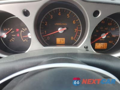 Zdjęcie 9 z 14 samochodu: 2006 NISSAN 350Z COUPE VIN:JN1AZ34E66M353414 - miniatura