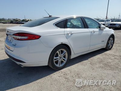 Trzecie zdjęcie samochodu z tyłu: 2018 FORD FUSION SE HYBRID VIN:3FA6P0LU2JR278703 - miniatura