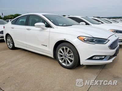 Czwarte zdjęcie samochodu z boku: 2017 FORD FUSION SE HYBRID VIN:3FA6P0LU0HR409721 - miniatura