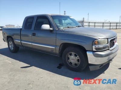 Czwarte zdjęcie samochodu z boku: 1999 GMC NEW SIERRA C1500 VIN:2GTEC19T9X1529493 - miniatura