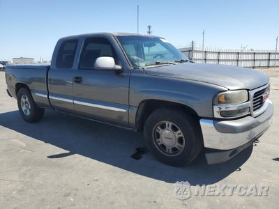 Czwarte zdjęcie samochodu z boku: 1999 GMC NEW SIERRA C1500 VIN:2GTEC19T9X1529493 - miniatura