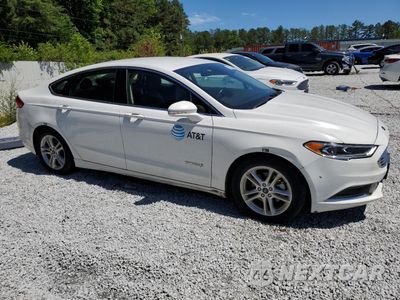 Czwarte zdjęcie samochodu z boku: 2018 FORD FUSION SE HYBRID VIN:3FA6P0LU1JR129909 - miniatura