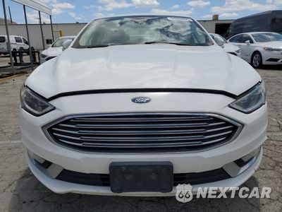 Piąte zdjęcie samochodu w środku: 2017 FORD FUSION SE HYBRID VIN:3FA6P0LU4HR409334 - miniatura