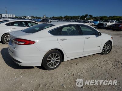 Trzecie zdjęcie samochodu z tyłu: 2017 FORD FUSION SE HYBRID VIN:3FA6P0LU3HR409468 - miniatura