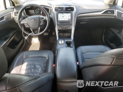 Zdjęcie 8 z 13 samochodu: 2017 FORD FUSION SE HYBRID VIN:3FA6P0LU5HR359592 - miniatura