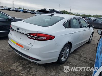 Trzecie zdjęcie samochodu z tyłu: 2018 FORD FUSION SE HYBRID VIN:3FA6P0LU7JR271276 - miniatura