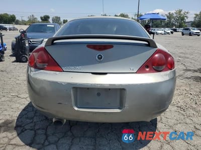 Zdjęcie 6 z 13 samochodu: 1999 MERCURY COUGAR V6 VIN:1ZWFT61L7X5652018 - miniatura