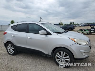 Czwarte zdjęcie samochodu z boku: 2013 HYUNDAI TUCSON GLS VIN:KM8JUCAC3DU560205 - miniatura