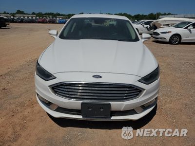 Piąte zdjęcie samochodu w środku: 2017 FORD FUSION SE HYBRID VIN:3FA6P0LU0HR409623 - miniatura